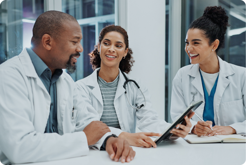 Happy smiling diverse medical team viewing results